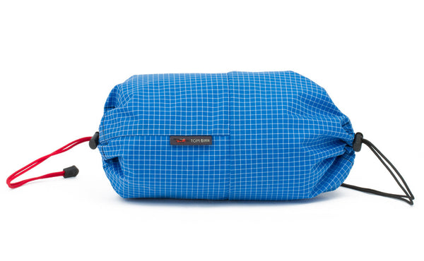 An Aeronaut 30 Travel Laundry Stuff Sack in Island (blue with white grid) 200 Halcyon.